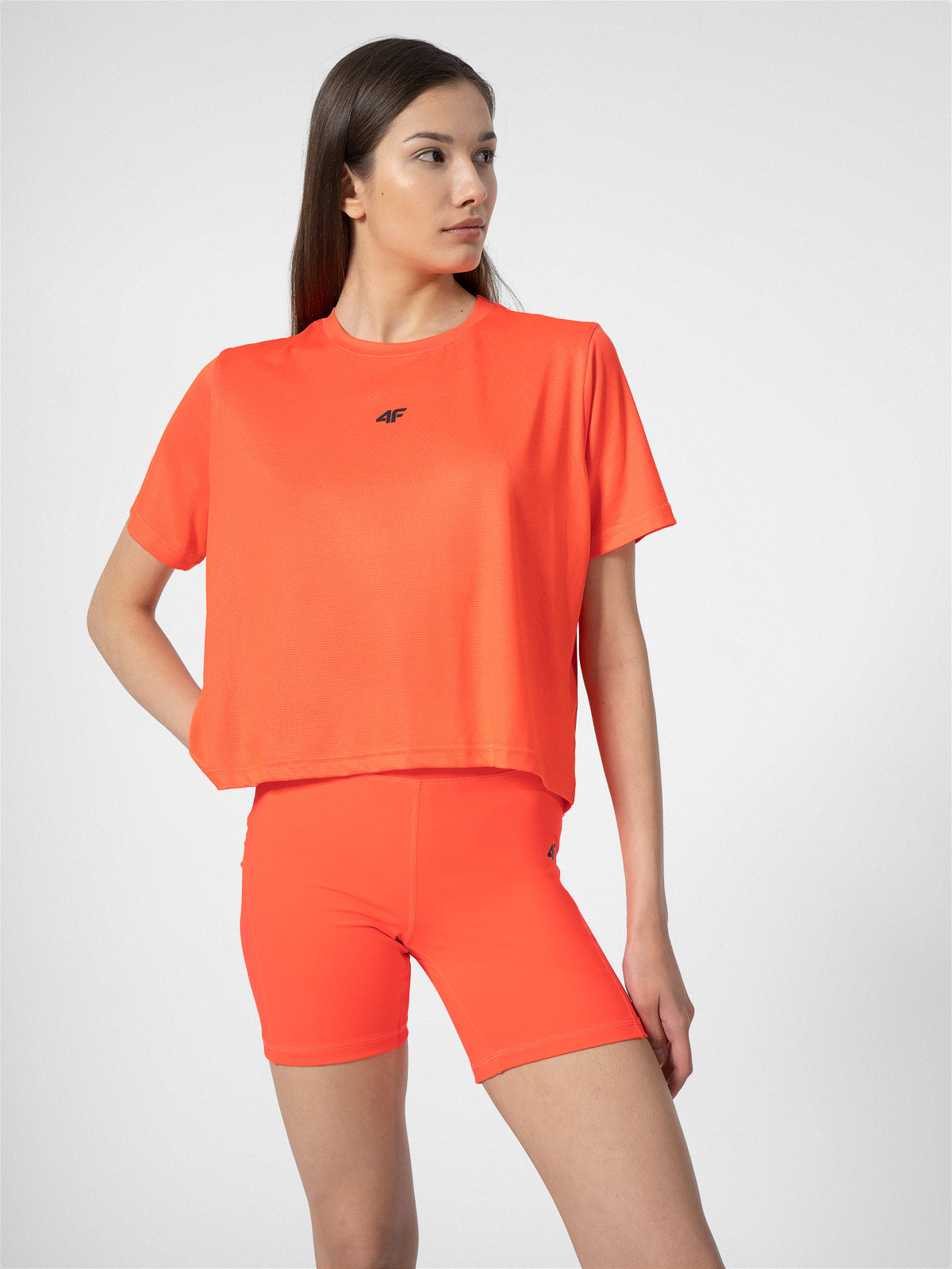 Levně 4F 4FSS23TFTSF152 RED NEON Dámské sportovní tričko