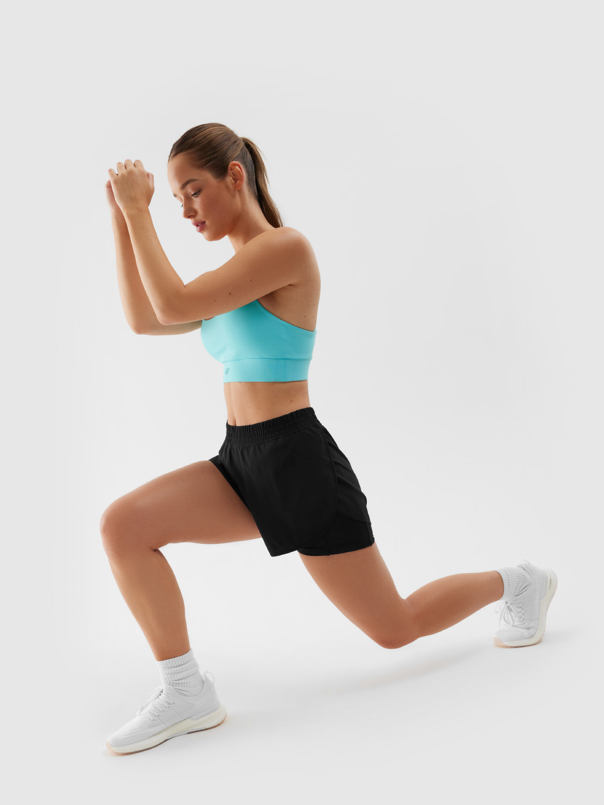 Levně 4F SHORTS FNK F497 Dámské sportovní kraťasy
